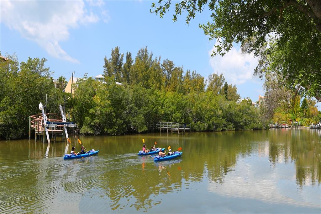 7510 Midnight Pass Road Sarasota, FL 34242 - Photo 15 of 25 a view of a lake with a house