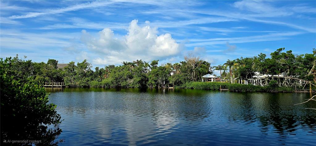 7510 Midnight Pass Road Sarasota, FL 34242 - Photo 2 of 25 a view of a lake view with a lake view