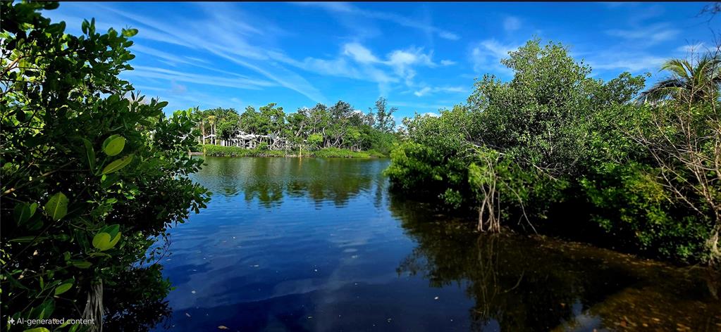 7510 Midnight Pass Road Sarasota, FL 34242 - Photo 4 of 25 a view of a lake in between two chairs