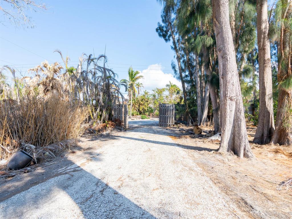 7510 Midnight Pass Road Sarasota, FL 34242 - Photo 7 of 25 a view of a backyard of the house