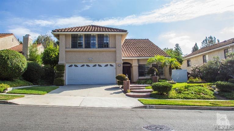 520 Fresh Meadows Road Simi Valley, CA 93065 - Photo 1 of 26 a front view of a house with a yard