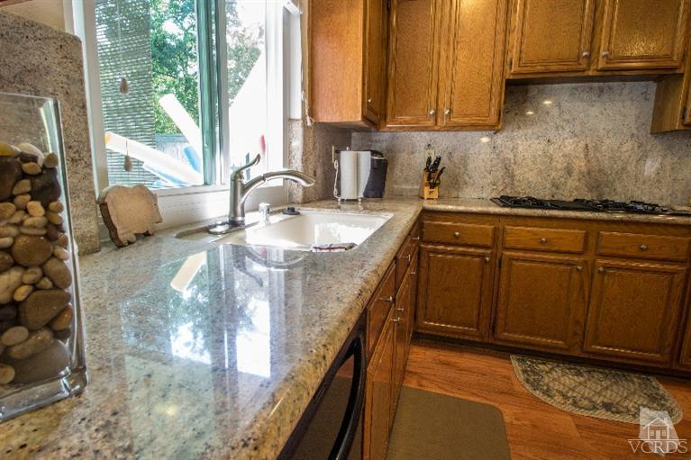 520 Fresh Meadows Road Simi Valley, CA 93065 - Photo 13 of 26 a kitchen with sink and cabinets