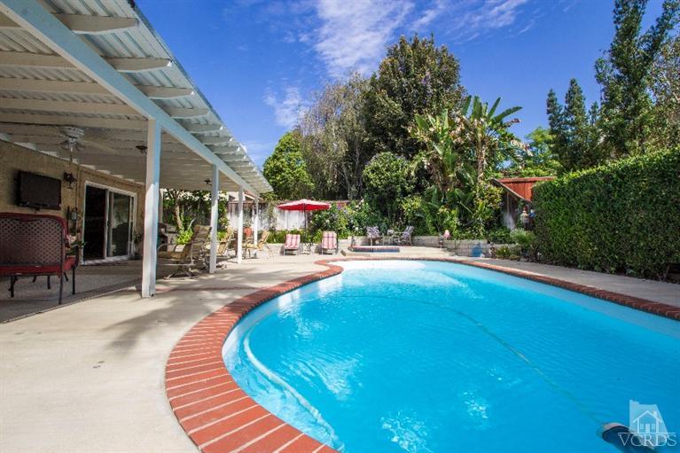 520 Fresh Meadows Road Simi Valley, CA 93065 - Photo 18 of 26 a swimming pool with outdoor seating and yard