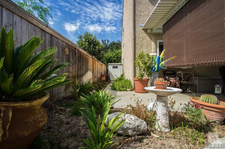 520 Fresh Meadows Road Simi Valley, CA 93065 - Photo 19 of 26 a view of a backyard with sitting area