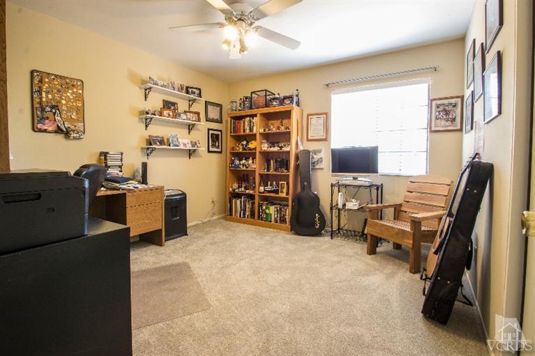 520 Fresh Meadows Road Simi Valley, CA 93065 - Photo 20 of 26 a view of a livingroom with workspace and a window