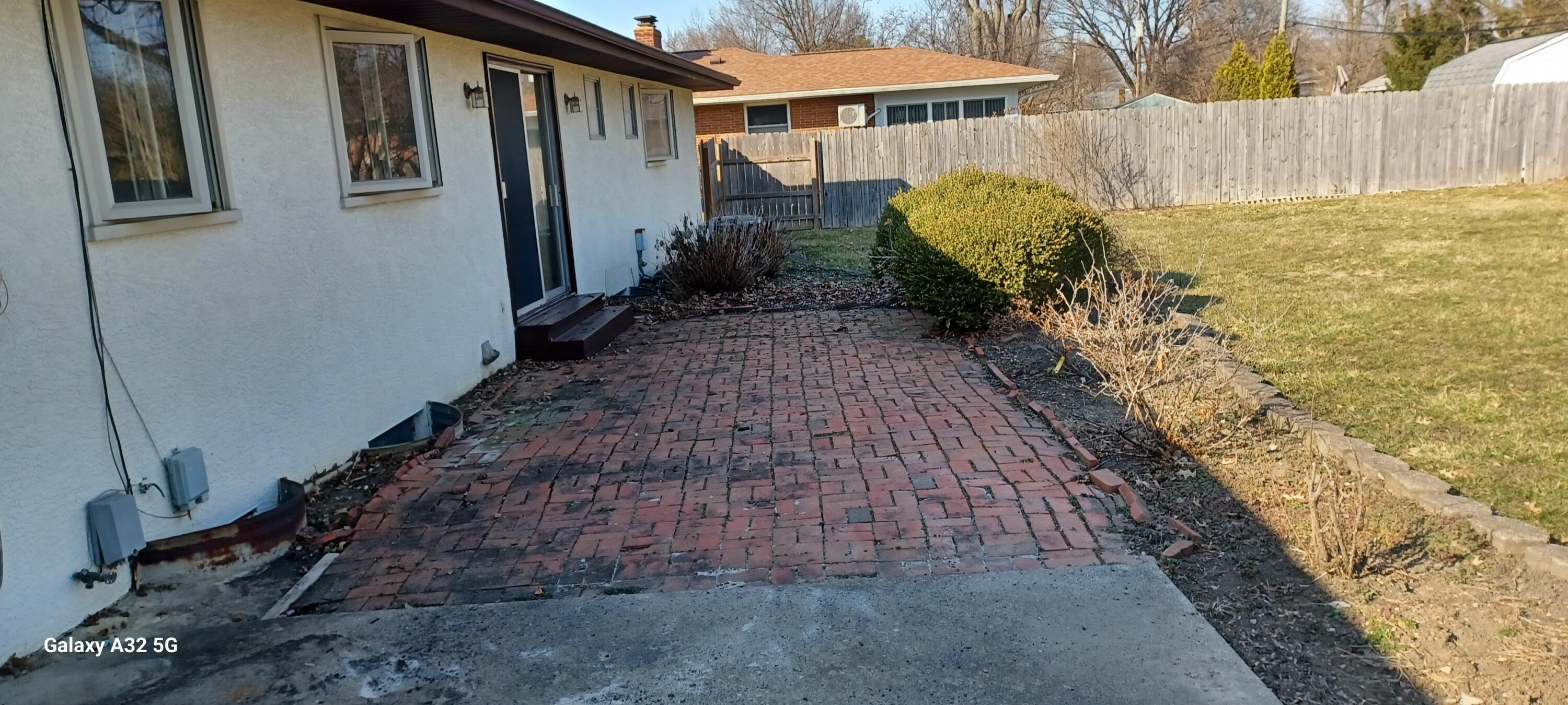 4336 Sandy Lane Road Columbus, OH 43224 - Photo 19 of 21 Back patio and porch