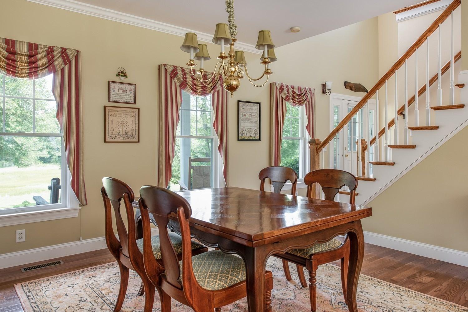 455 Turtleback Road Marstons Mills, MA 02648 - Photo 14 of 29 a view of a dining room with furniture window and outside view