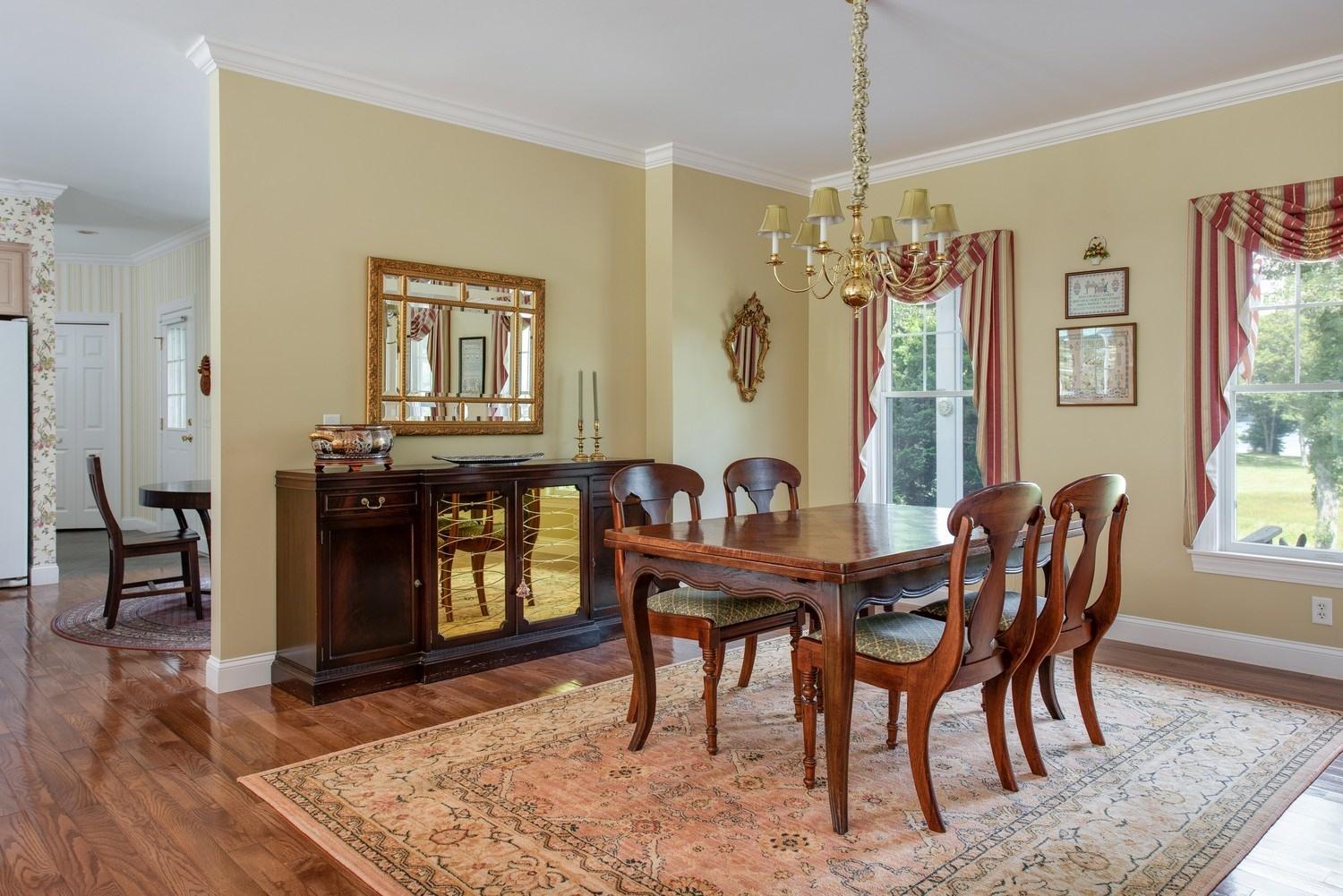455 Turtleback Road Marstons Mills, MA 02648 - Photo 15 of 29 a view of a dining room with furniture and window