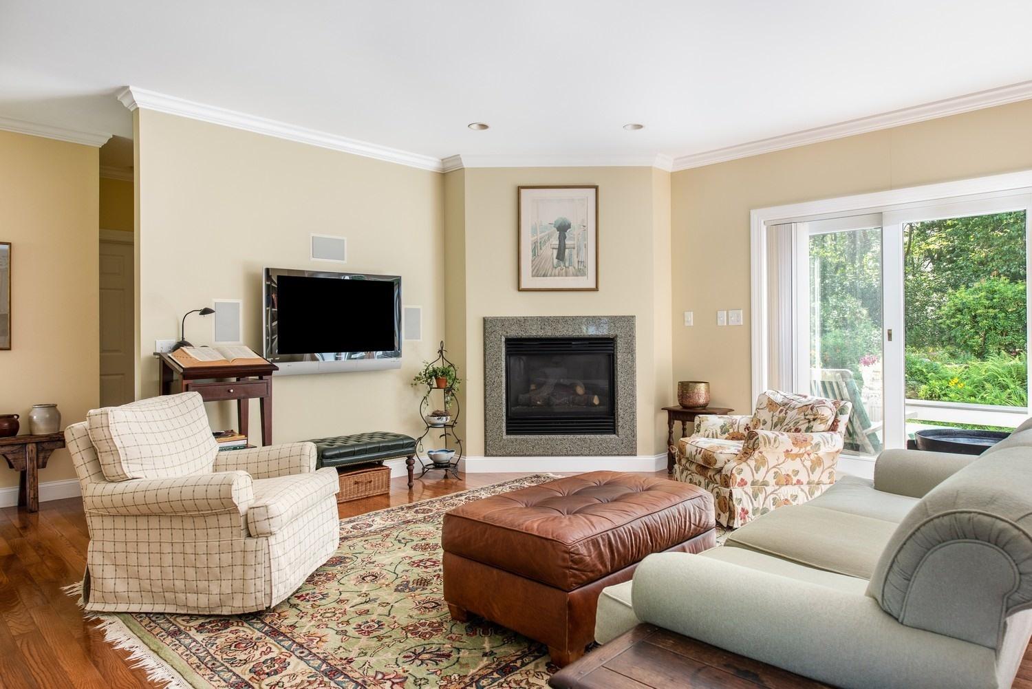 455 Turtleback Road Marstons Mills, MA 02648 - Photo 20 of 29 a living room with furniture fireplace and flat screen tv