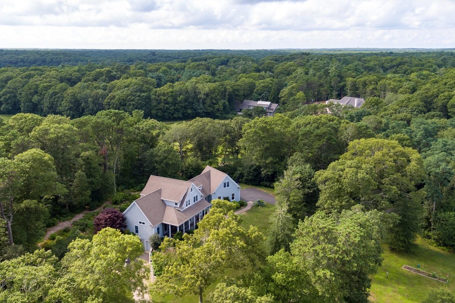 455 Turtleback Road Marstons Mills, MA 02648 - Photo 28 of 29 an aerial view of a house with a garden