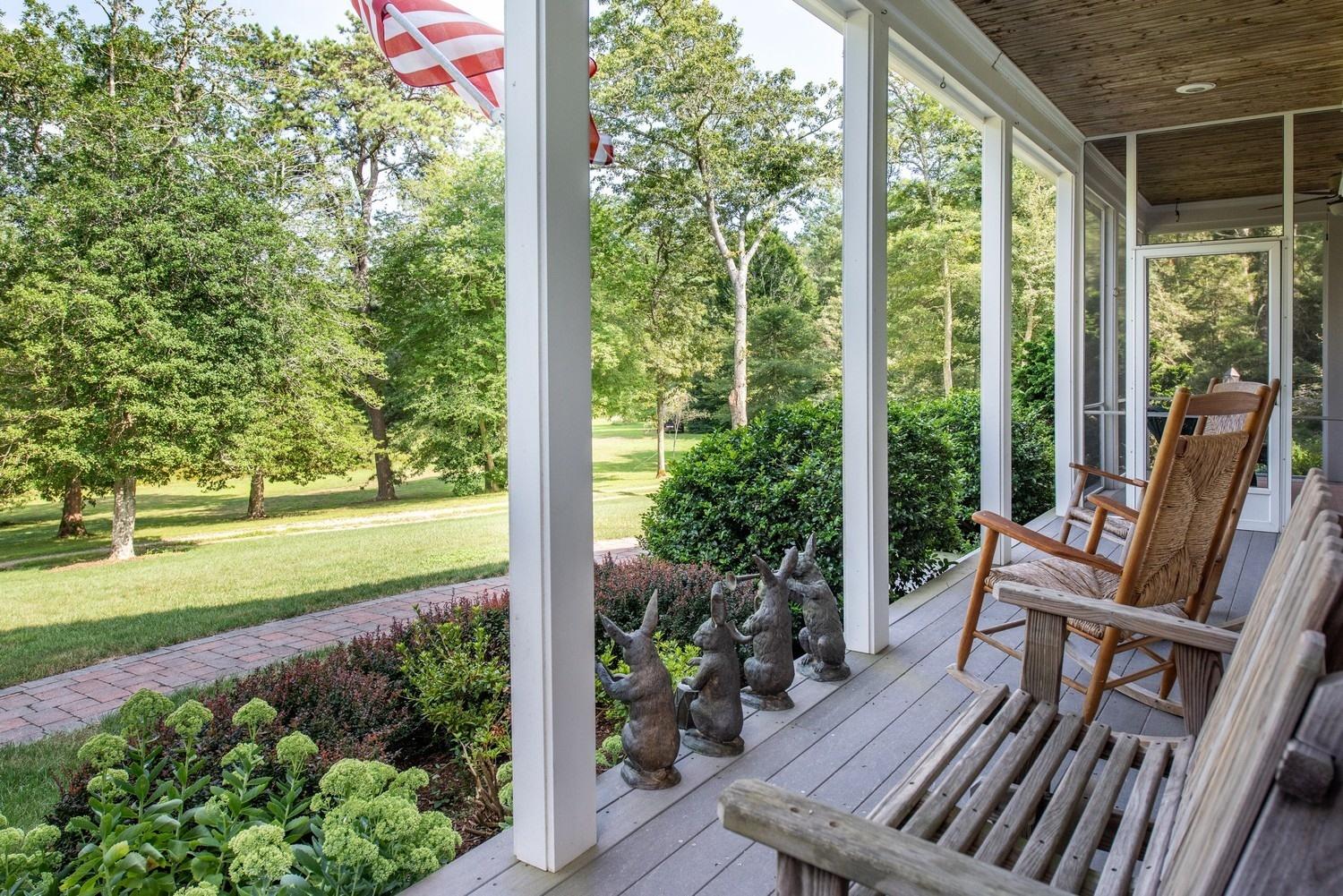 455 Turtleback Road Marstons Mills, MA 02648 - Photo 6 of 29 a view of a deck with chair and wooden floor
