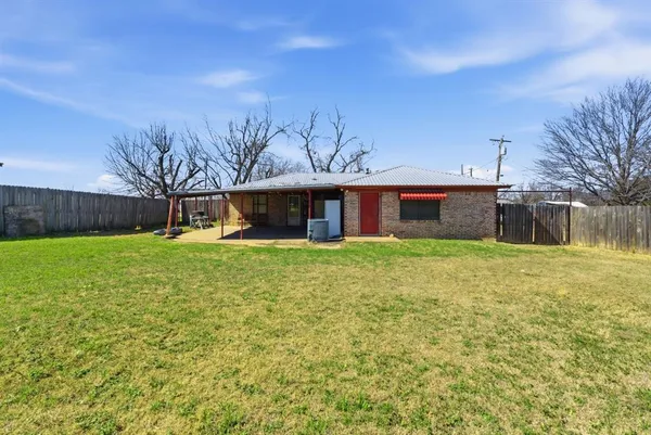 a front view of house with yard