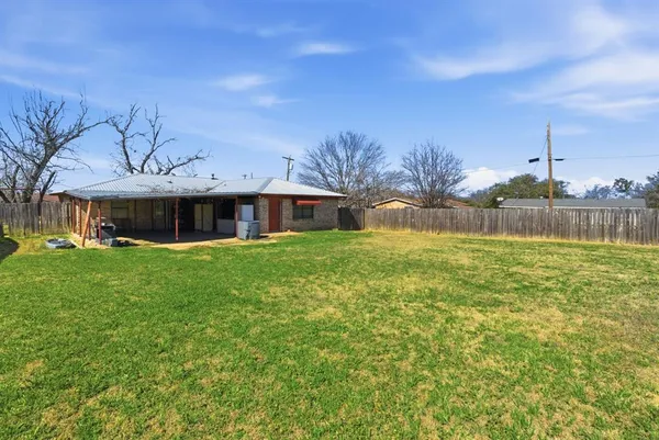a front view of house with yard
