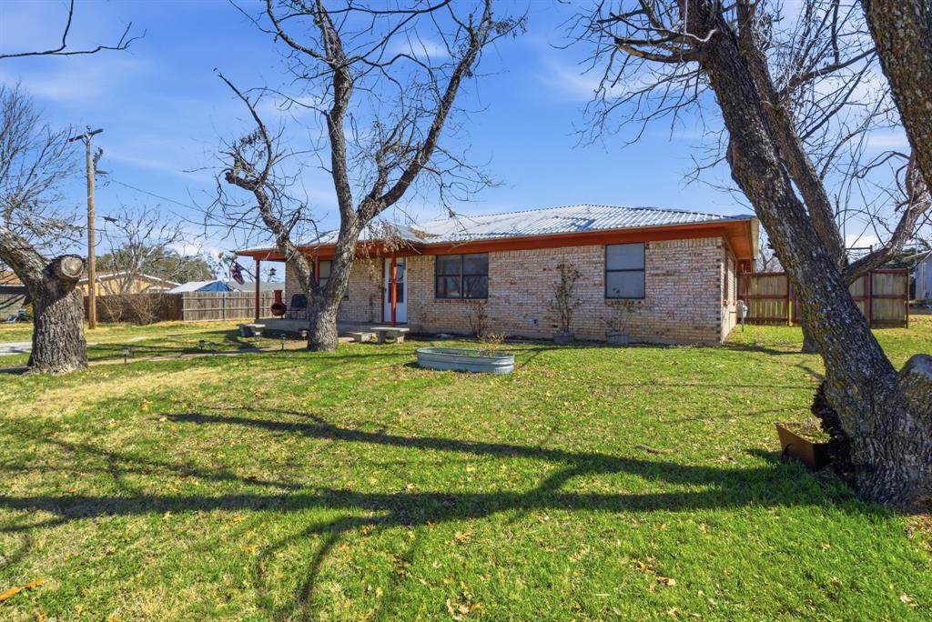 504 North Hall Street Hamilton, TX 76531 - Photo 4 of 31 a view of a house with a yard