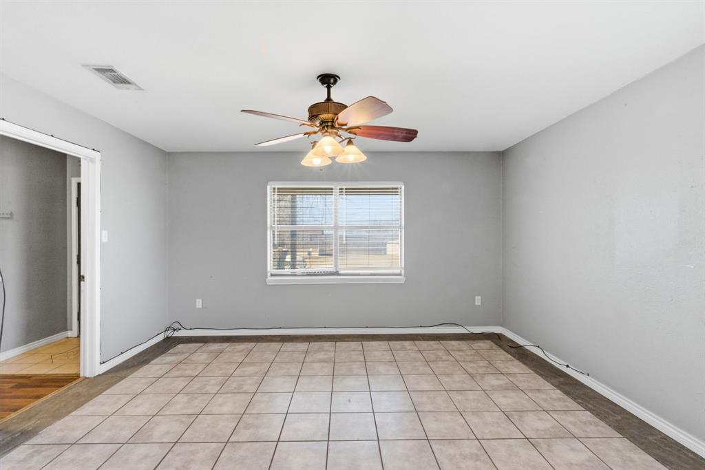 504 North Hall Street Hamilton, TX 76531 - Photo 7 of 31 a view of an empty room and window