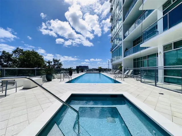 a view of a balcony with a patio