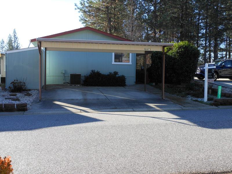 10073 Dalewood Way Grass Valley, CA 95949 - Photo 1 of 34 a front view of a house with garden