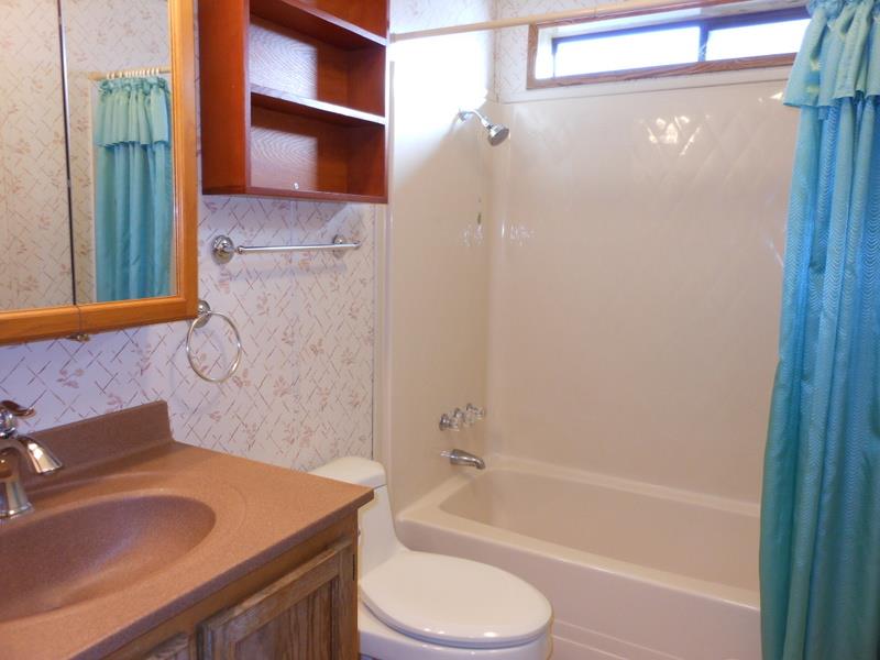 10073 Dalewood Way Grass Valley, CA 95949 - Photo 17 of 34 a bathroom with a sink toilet and shower