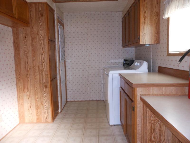 10073 Dalewood Way Grass Valley, CA 95949 - Photo 20 of 34 a utility room with sink dryer and washer