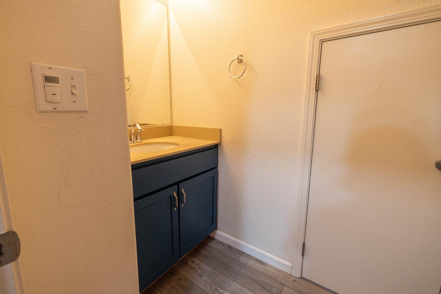 3122 Lea Sterling Way Rancho Cordova, CA 95670 - Photo 8 of 31 a bathroom with a sink and a mirror