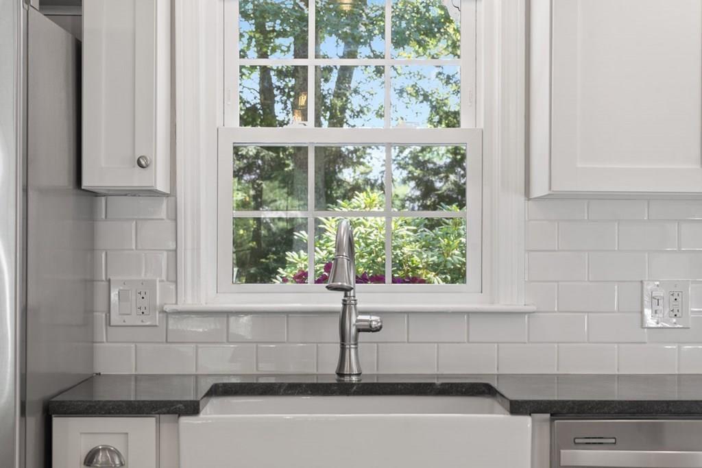 130 Monsen Road Concord, MA 01742 - Photo 11 of 26 a bathroom with a bathtub and window