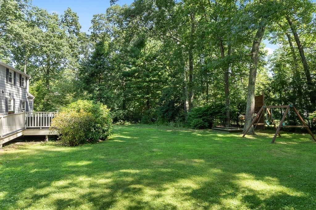 130 Monsen Road Concord, MA 01742 - Photo 7 of 26 a view of a house with a back yard