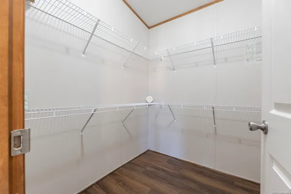 a view of a room with racks on the wall