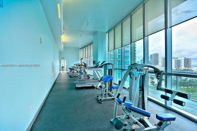 a view of swimming pool with outdoor seating