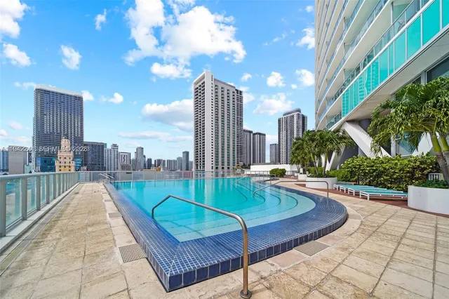 a view of a kitchen with a sink and a stove