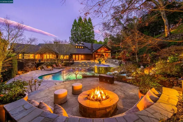 a view of a swimming pool with a patio