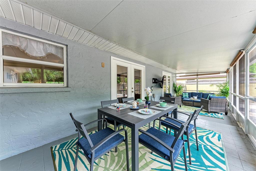 6715 12th Avenue Northwest Bradenton, FL 34209 - Photo 42 of 43 a view of a dining room with furniture window and outside view