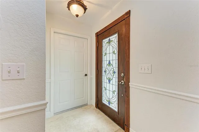 a view of livingroom with front door