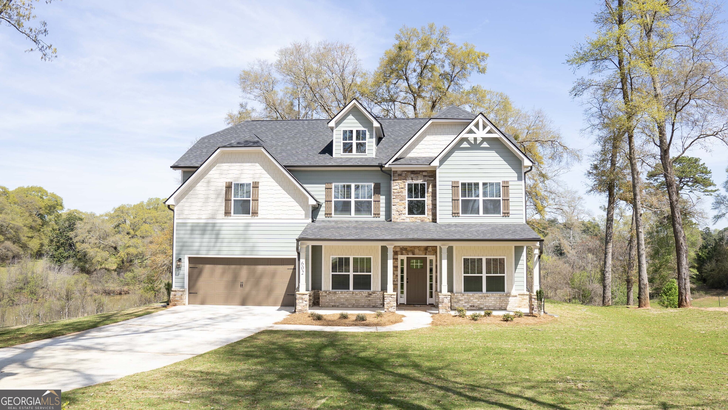 604 Beaver Court Perry, GA 31069 - Photo 1 of 40 a front view of a house with a yard