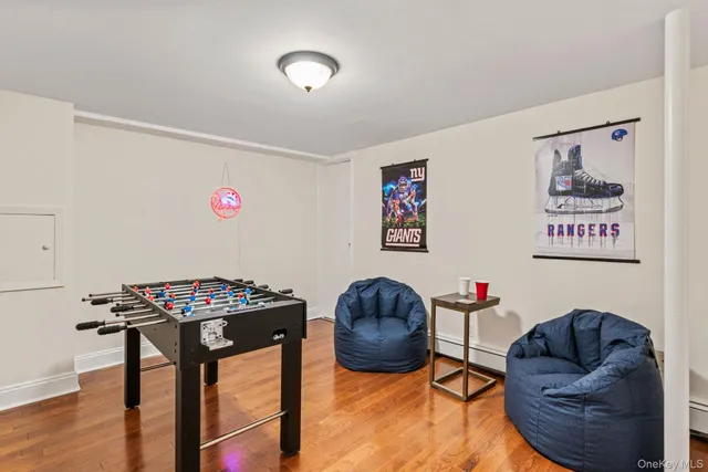 a livingroom with furniture and a flat screen tv