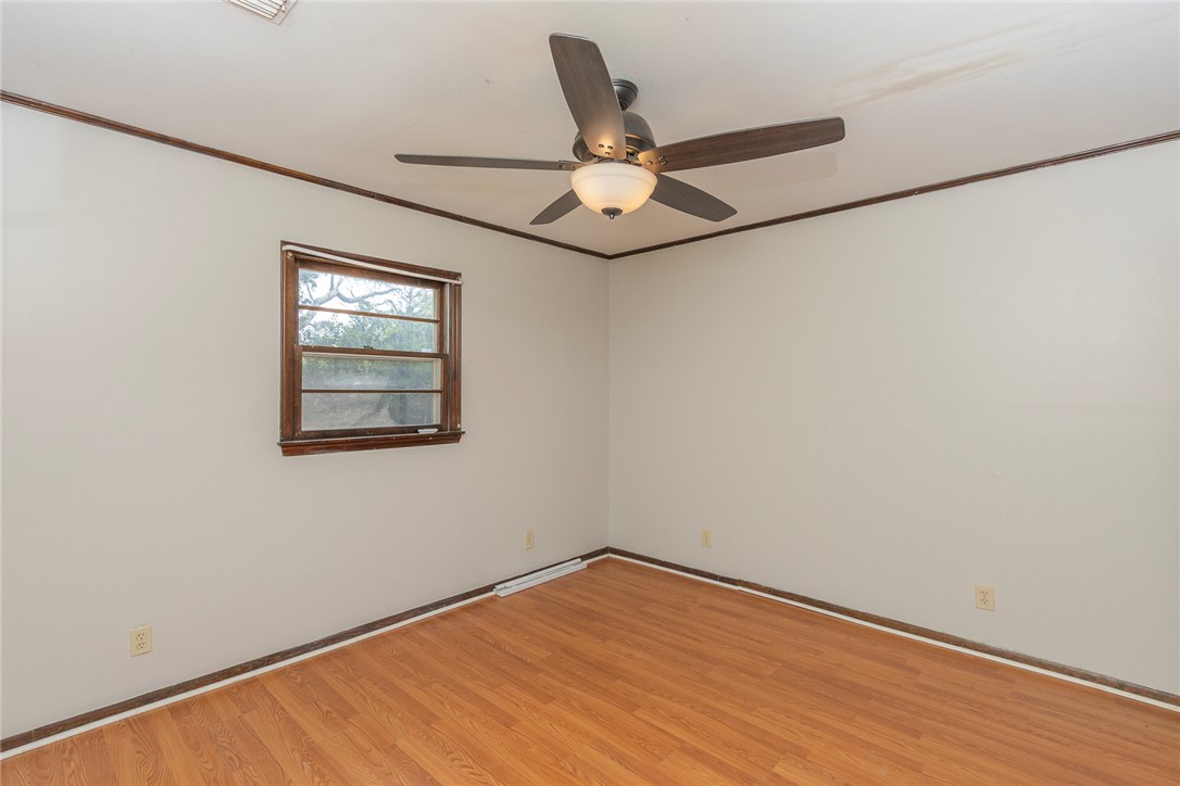 820 Travis Road Anderson, SC 29626 - Photo 37 of 46 This bright room features a window overlooking lush trees, perfect for a peaceful retreat.