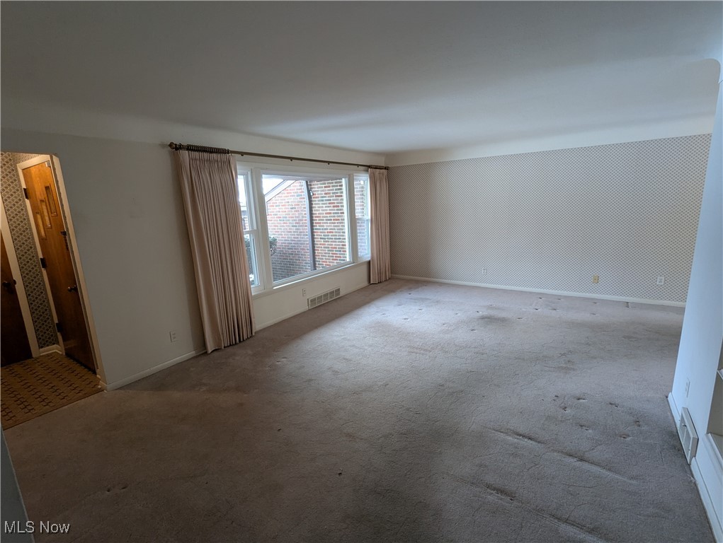 815 East Schaaf Road Independence, OH 44131 - Photo 5 of 36 Empty room with light colored carpet