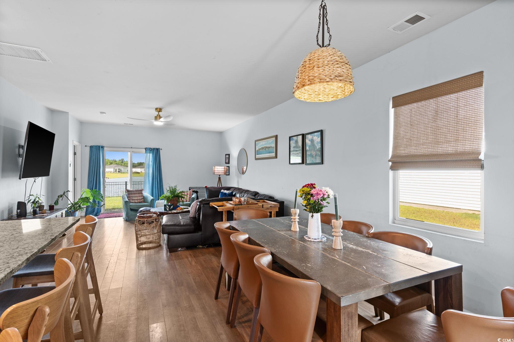 196 Cypress Tree Loop Longs, SC 29568 - Photo 10 of 40 Dining space with hardwood / wood-style flooring and a ceiling fan
