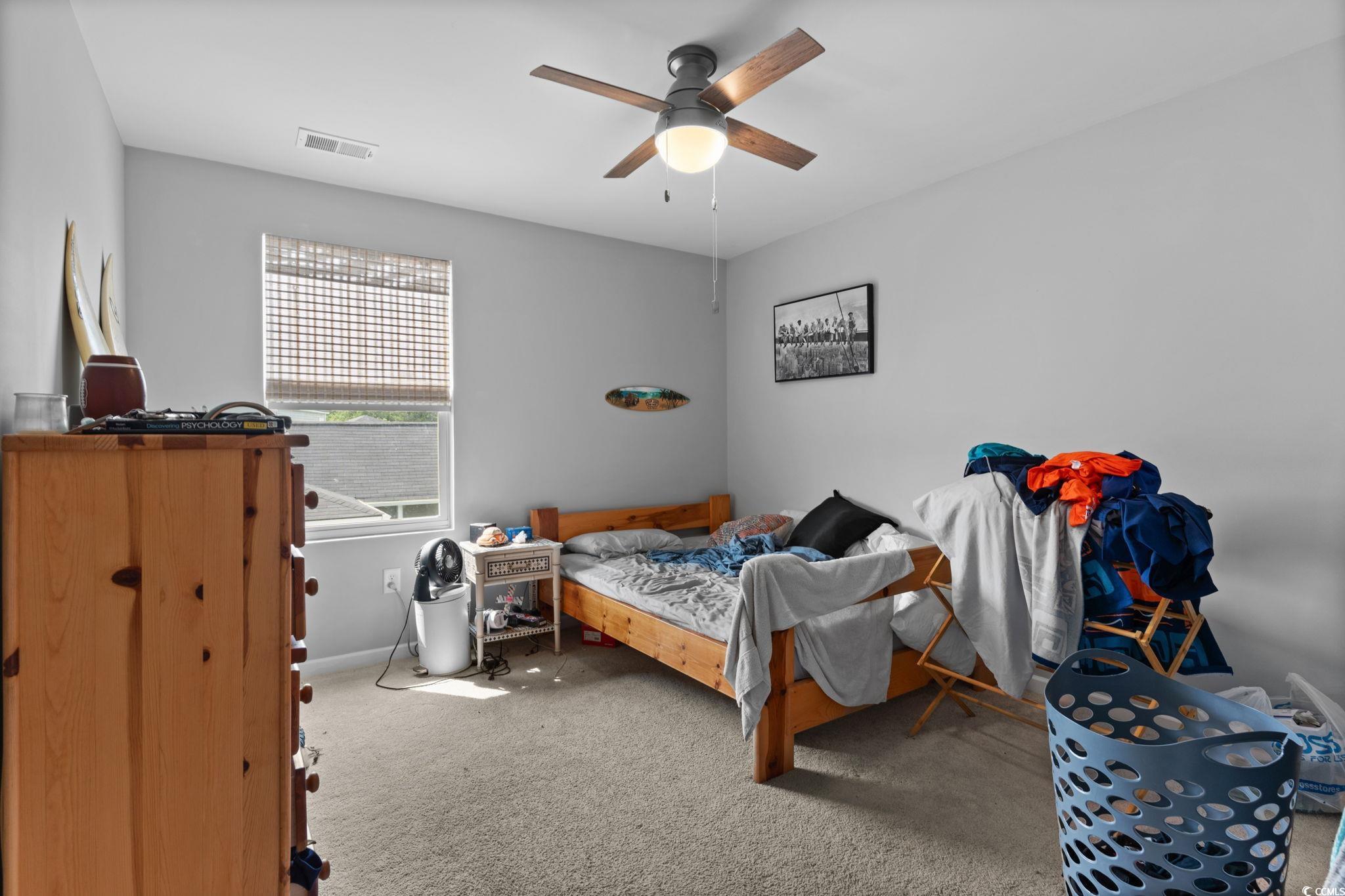 196 Cypress Tree Loop Longs, SC 29568 - Photo 30 of 40 Carpeted bedroom with baseboards and ceiling fan