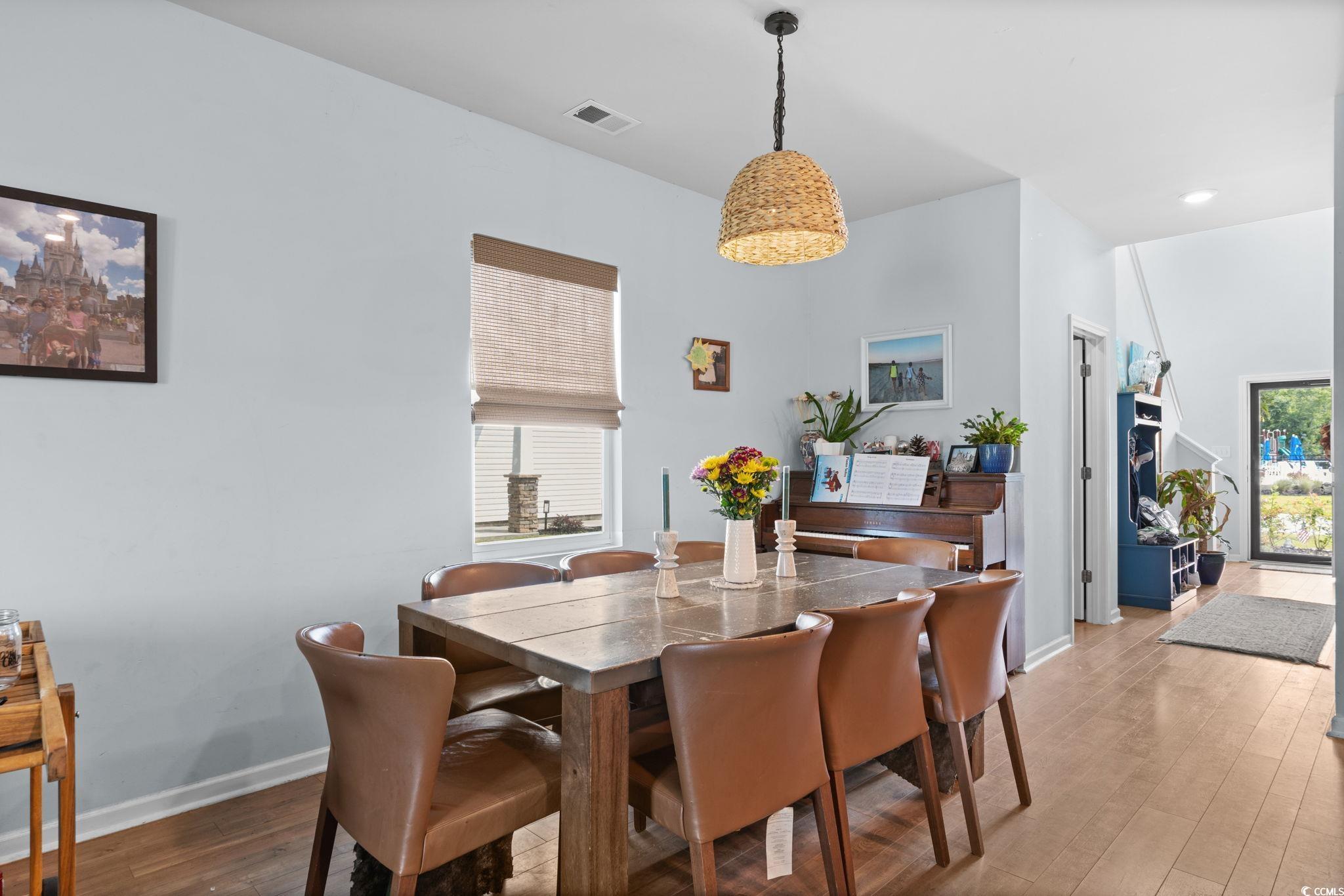 196 Cypress Tree Loop Longs, SC 29568 - Photo 8 of 40 Dining space featuring light wood-style flooring, baseboards, and recessed lighting