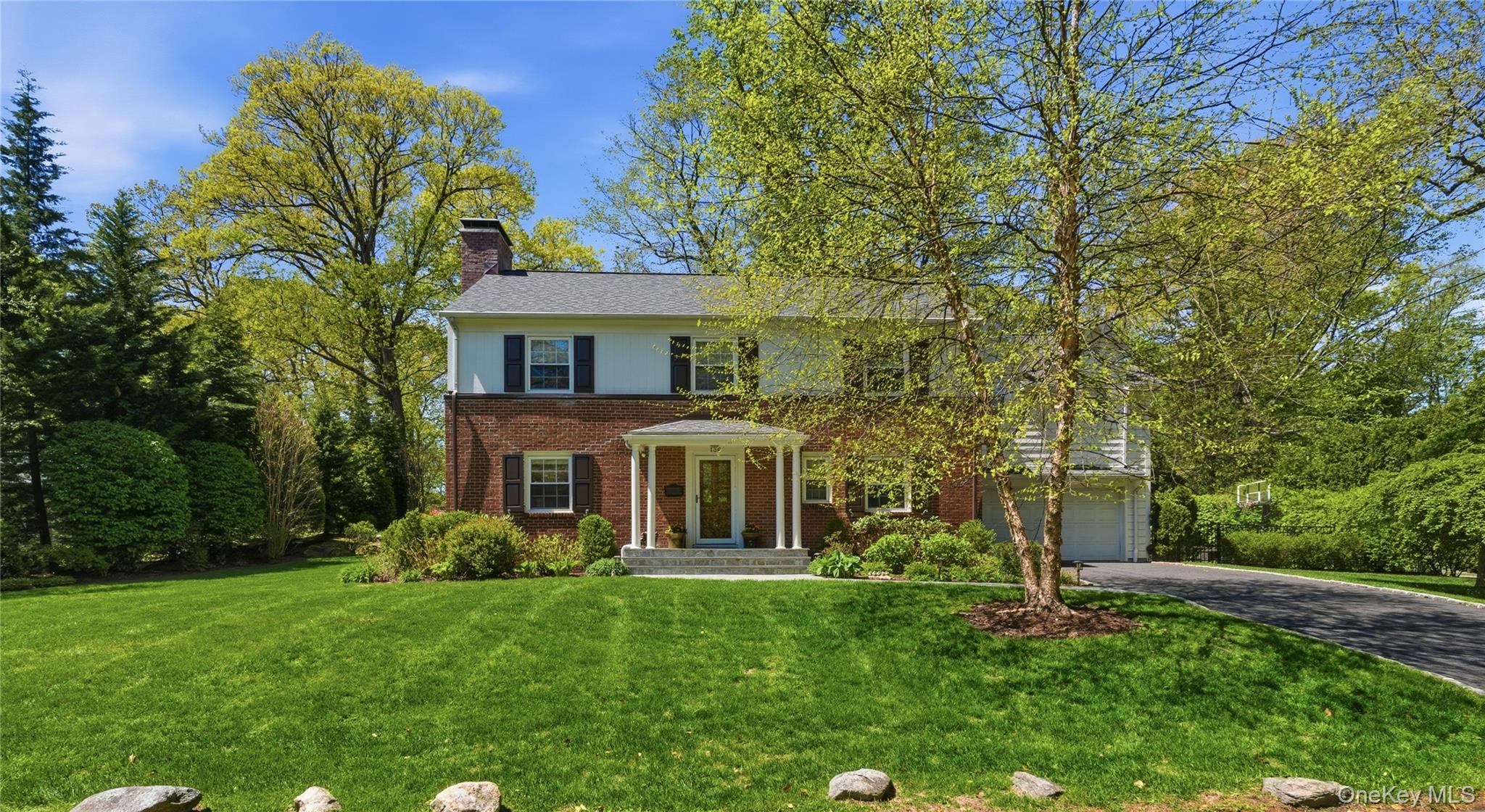 136 Devonshire Road Larchmont, NY 10538 - Photo 1 of 34 a view of a house with a yard
