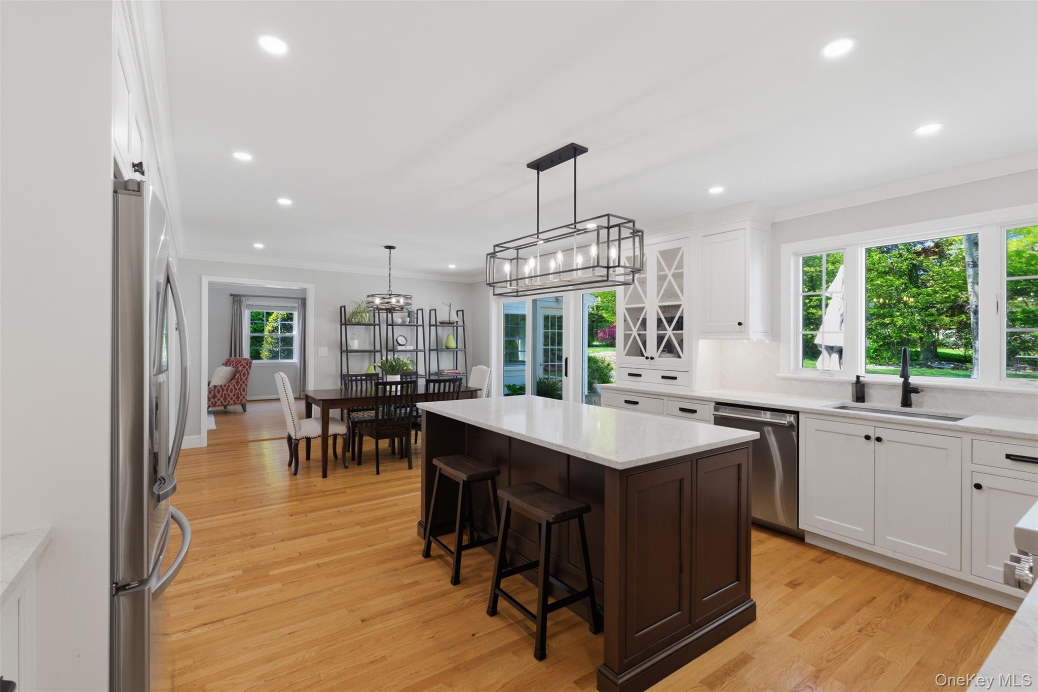 136 Devonshire Road Larchmont, NY 10538 - Photo 11 of 34 a large kitchen with a table and chairs