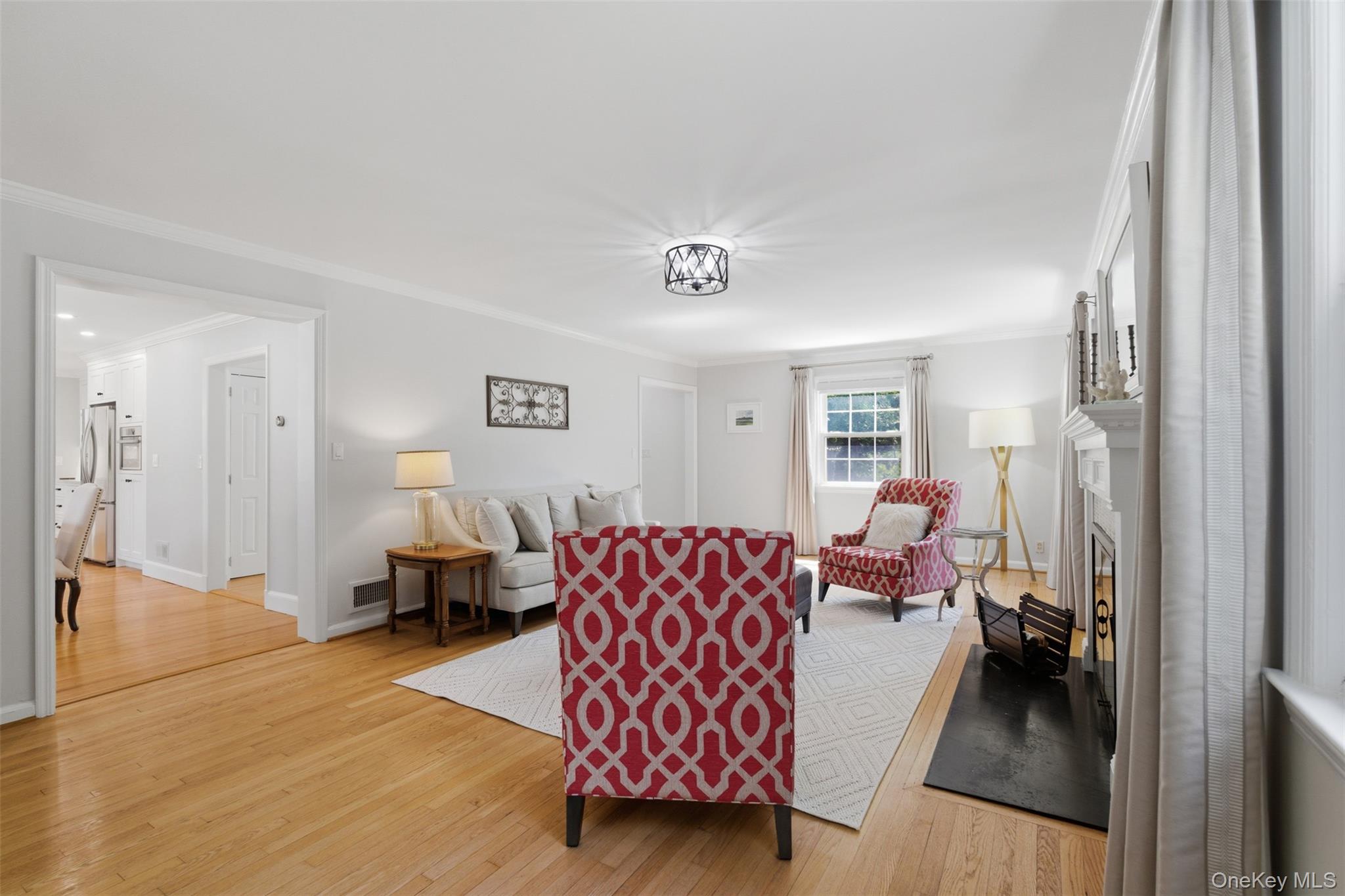 136 Devonshire Road Larchmont, NY 10538 - Photo 7 of 34 a bedroom with furniture and a couch