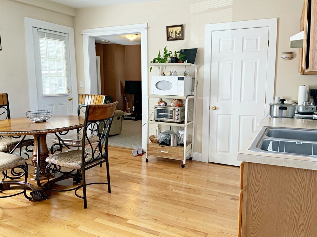 250 Main Street Springfield, MA 01151 - Photo 3 of 20 a view of a dining room with furniture and a window