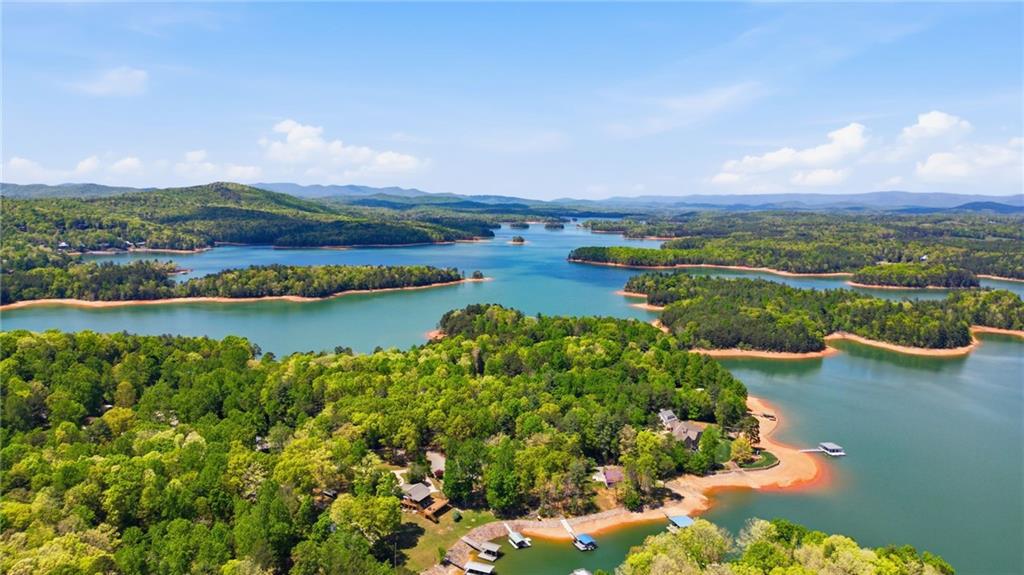 191 Oakwood Road Blairsville, GA 30512 - Photo 42 of 43 a view of a lake with houses in the back