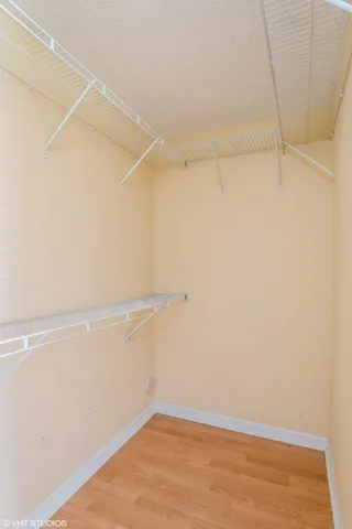 a view of an empty walk in closet
