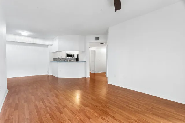 a bathroom with a double vanity sink and mirror