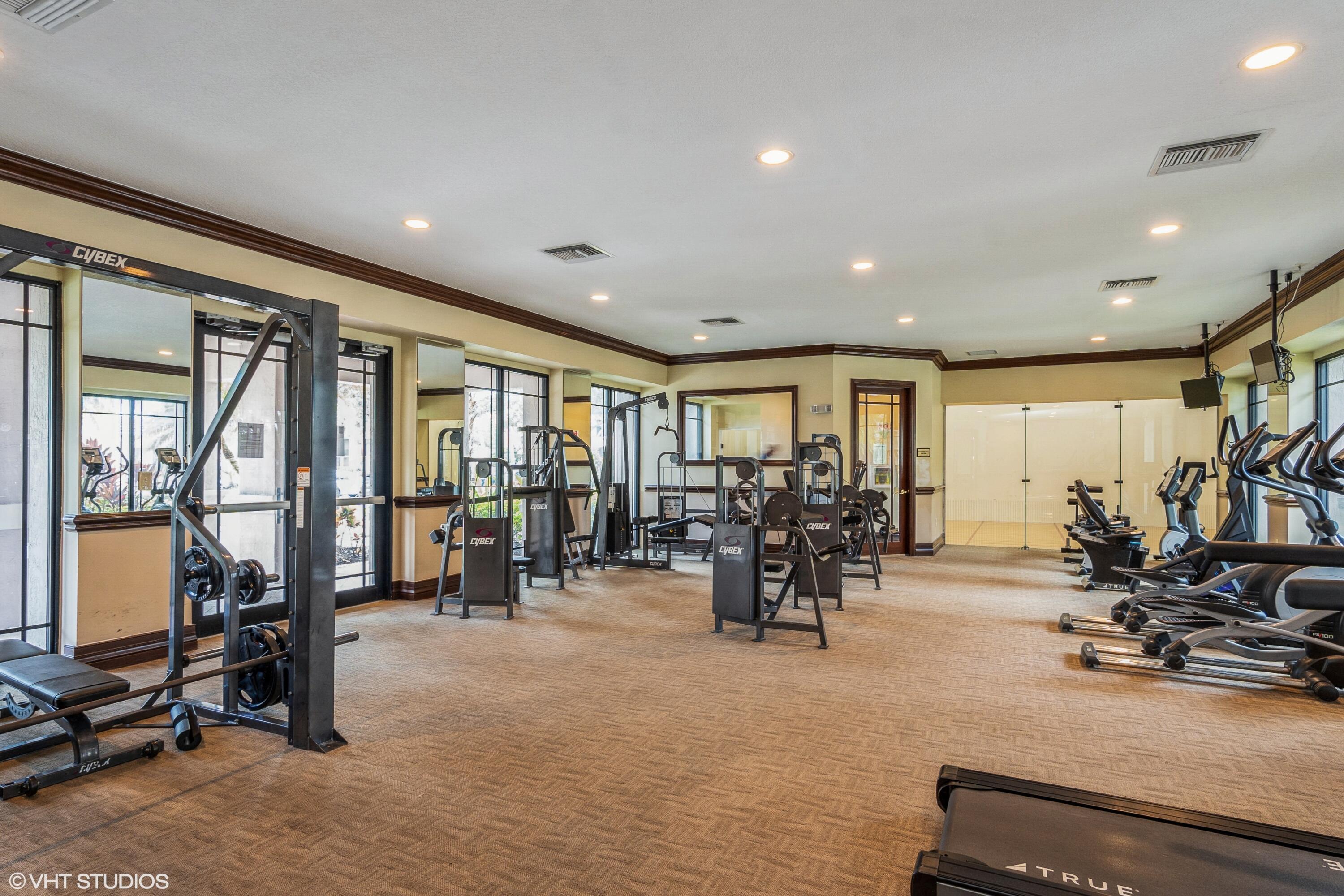 2725 Anzio Court, Unit 102 Palm Beach Gardens, FL 33410 - Photo 28 of 33 a view of a room with gym equipment