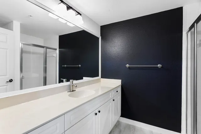 a view of a kitchen with wooden floor