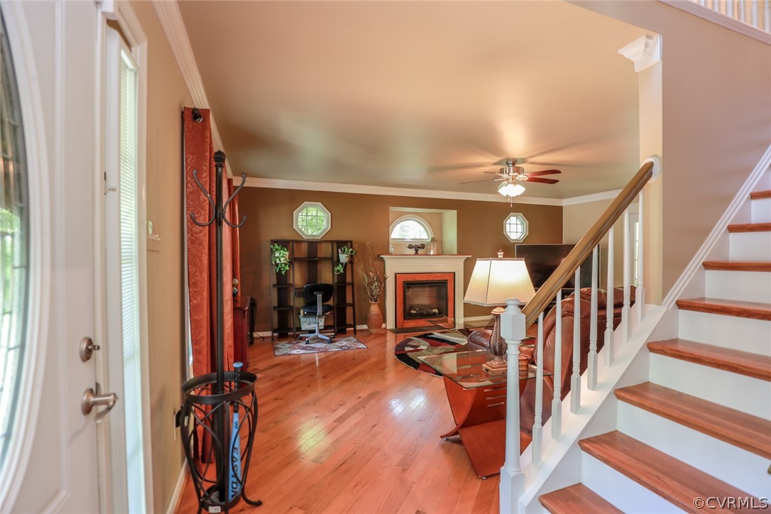 4902 Logswood Road Chesterfield, VA 23832 - Photo 11 of 50 a view of a livingroom with furniture and hardwood floor