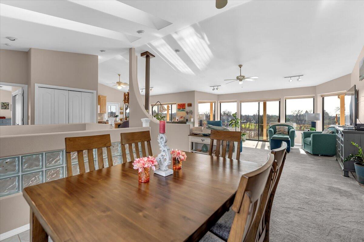 22560 Adobe Road Red Bluff, CA 96080 - Photo 17 of 49 a view of a dining room with furniture and a livingroom